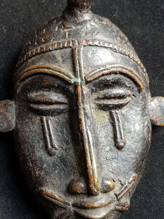 Oud bronzen valuta masker uit Benin, Nigeria - Rootz Gallery