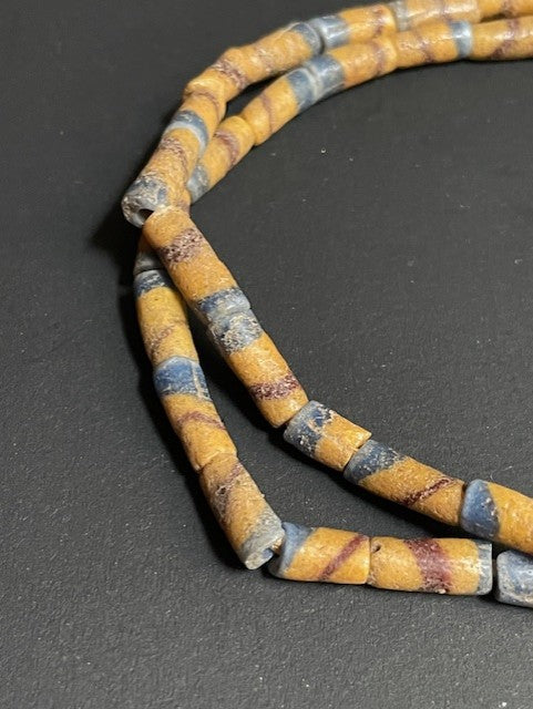 Vintage handelskralen ketting uit Ghana geel gestreept