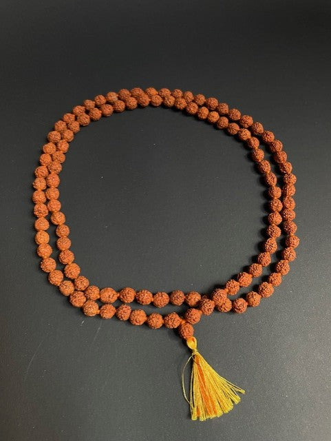 Long rudraksha necklace from India - yellow