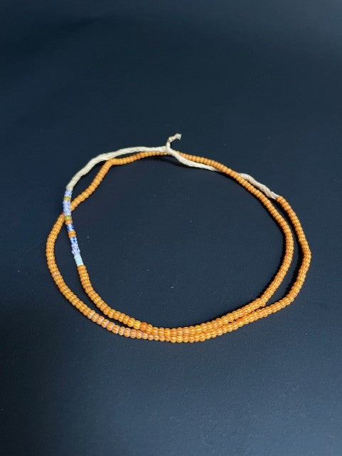 Vintage handelskralen ketting uit Ghana oranje-rood