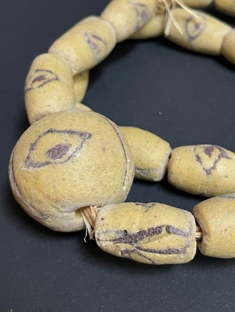 Long vintage tradebeads necklace from Ghana yellow with ball